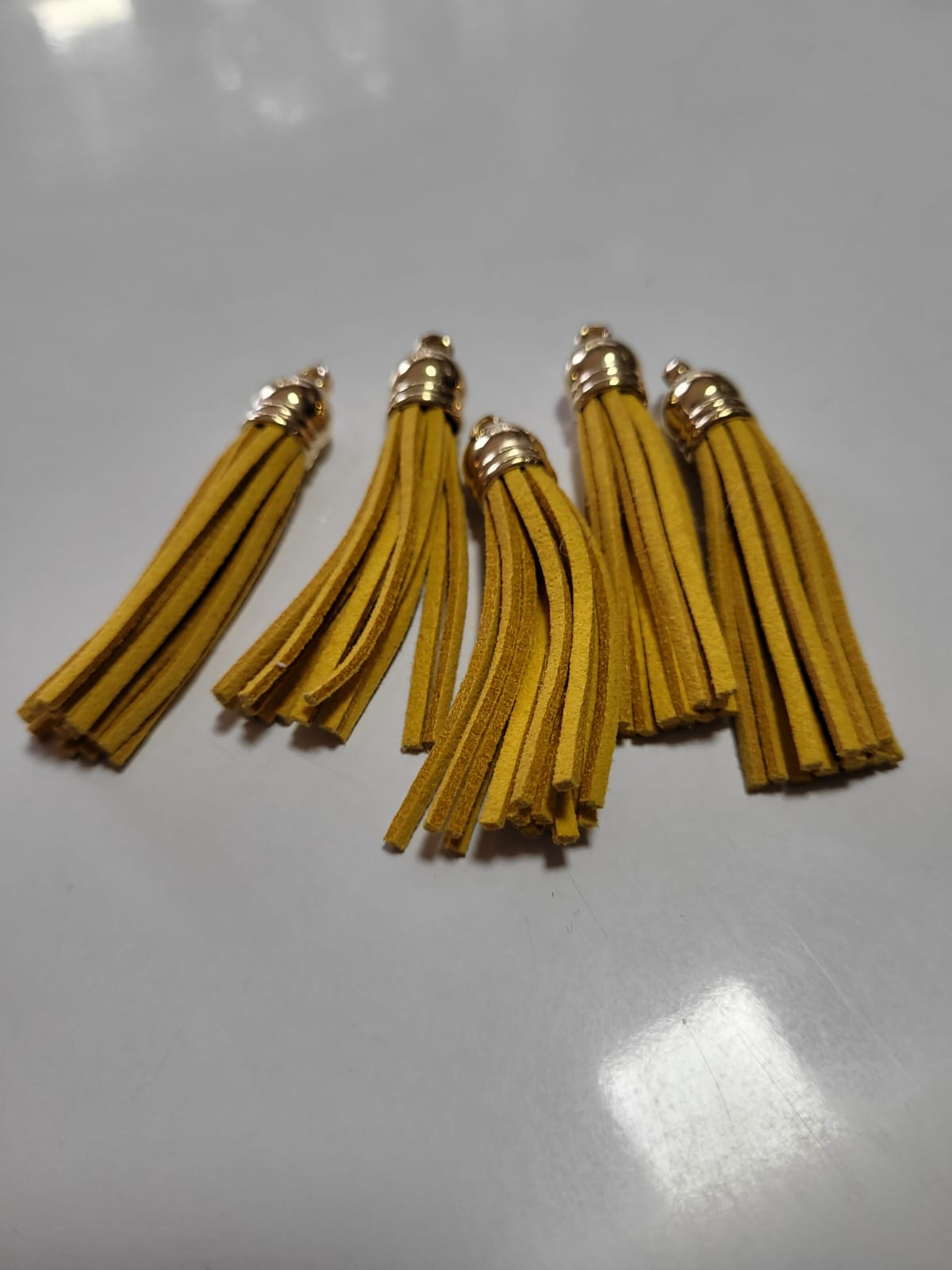 BORLAS DE GAMUZA CASCO DORADO