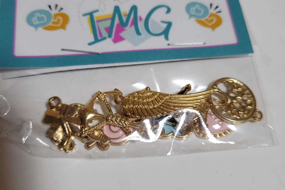 Dijes decorativos dorados